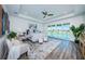 Spacious main bedroom with water views and sitting area at 12305 3Rd E St # 3, Treasure Island, FL 33706