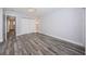 Bedroom with beautiful flooring, ample closet space, and neutral paint at 1868 Shore S Dr # 410, South Pasadena, FL 33707