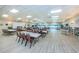 Expansive clubhouse features tables, chairs, and a library for various activities and events at 1868 Shore S Dr # 410, South Pasadena, FL 33707