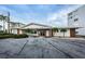 Image shows the exterior facade of a well-maintained building at 1868 Shore S Dr # 410, South Pasadena, FL 33707