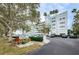 Exterior view of Shore Towers and the surrounding landscape at 1868 Shore S Dr # 410, South Pasadena, FL 33707