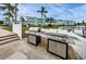 Outdoor grilling area with stainless steel grills and plenty of space to cook out at 1868 Shore S Dr # 410, South Pasadena, FL 33707