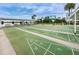 Enjoy friendly competition on well-maintained shuffleboard courts, a great outdoor amenity for residents at 1868 Shore S Dr # 410, South Pasadena, FL 33707