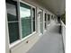 Exterior hallway view of the building with access to unit 64 at 2426 Persian Dr # 64, Clearwater, FL 33763