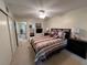 Bright bedroom with a double bed and plenty of light at 2426 Persian Dr # 64, Clearwater, FL 33763