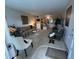 Bright living room with comfy seating and a fireplace at 2426 Persian Dr # 64, Clearwater, FL 33763