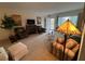 Relaxing living room with fireplace and plenty of natural light at 2426 Persian Dr # 64, Clearwater, FL 33763