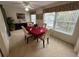 Bright dining area with a table and four chairs at 2426 Persian Dr # 64, Clearwater, FL 33763