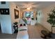 Charming living room with built-in shelving and comfy armchair at 2426 Persian Dr # 64, Clearwater, FL 33763