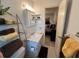 Well-lit bathroom with a vanity and view into bedroom at 2426 Persian Dr # 64, Clearwater, FL 33763