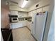Clean and functional kitchen with ample counter space at 2426 Persian Dr # 64, Clearwater, FL 33763