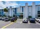 Exterior view showing ample parking spaces at 171 Medallion Blvd # H, Madeira Beach, FL 33708