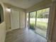 Private backyard view from sliding glass doors at 1701 Pinehurst Rd # 26E, Dunedin, FL 34698