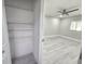 Walk-in closet with wire shelving for storage at 1701 Pinehurst Rd # 26E, Dunedin, FL 34698