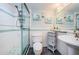 Bathroom with shower, toilet and vanity at 2699 Seville Blvd # 105, Clearwater, FL 33764
