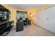 Home office with desk, chair, and built-in shelving at 2699 Seville Blvd # 105, Clearwater, FL 33764