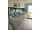 Shared laundry room with coin-operated machines at 7740 Boca Ciega Dr # 209, St Pete Beach, FL 33706