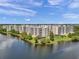 Spacious waterfront condo complex features lush landscaping and picturesque views of the surrounding waterway at 1200 Country Club Dr # 2106, Largo, FL 33771