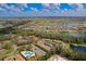 Aerial view of community, showcasing homes and landscape at 402 Lake Point Ct # D, Sun City Center, FL 33573