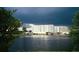 Exterior view of building overlooking a lake at 1200 Country Club Dr # 2106, Largo, FL 33771