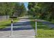 Scenic paved bike path through lush greenery at 898 Skye Ln, Palm Harbor, FL 34683