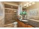 Elegant bathroom with tile shower, granite vanity, and modern fixtures at 898 Skye Ln, Palm Harbor, FL 34683