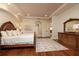 Bright main bedroom with hardwood floors and large windows at 898 Skye Ln, Palm Harbor, FL 34683