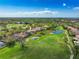 Luxury home with a desirable location overlooking a golf course and pond, offering serene views at 898 Skye Ln, Palm Harbor, FL 34683