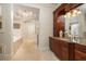 Elegant bathroom with a large vanity and soaking tub at 898 Skye Ln, Palm Harbor, FL 34683