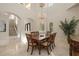 Bright dining room with chandelier and hardwood floors at 898 Skye Ln, Palm Harbor, FL 34683