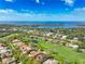 Luxury home with pool and spa, situated on a golf course with water views at 898 Skye Ln, Palm Harbor, FL 34683