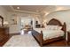 Spacious main bedroom with fireplace and sitting area at 898 Skye Ln, Palm Harbor, FL 34683