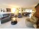 Open concept living and dining area with ample seating at 2361 Jamaican St # 15, Clearwater, FL 33763