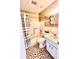 Cozy bathroom with decorative tile flooring, tub with shower, vanity and toilet at 2256 Philippine Dr # 46, Clearwater, FL 33763