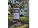 Community amenities sign directing to the East Activity Center, Golf Course, Tennis, Pool, and Good Karma Cafe at 2256 Philippine Dr # 46, Clearwater, FL 33763