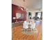 Bright dining area with a round table and four chairs, situated near the living room at 2256 Philippine Dr # 46, Clearwater, FL 33763