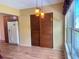 Bright eat-in kitchen features hardwood floors, stainless appliances, and lots of natural light at 2256 Philippine Dr # 46, Clearwater, FL 33763