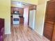 Bright kitchen with wood cabinets, stainless steel appliances, and hardwood floors at 2256 Philippine Dr # 46, Clearwater, FL 33763