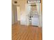 This laundry room features a stacked washer and dryer unit and closet with shelving at 2256 Philippine Dr # 46, Clearwater, FL 33763