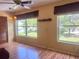 Bright living room with plenty of natural light, ceiling fan, and beautiful laminate flooring at 2256 Philippine Dr # 46, Clearwater, FL 33763