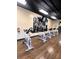 Spin room featuring stationary bikes, a wall-mounted television, and motivational decor at 2256 Philippine Dr # 46, Clearwater, FL 33763
