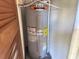 Hot water heater with easily visible labeling and maintenance information at 2256 Philippine Dr # 46, Clearwater, FL 33763
