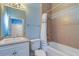Bathroom with a soaking tub and shower combination, offering a relaxing space for personal care at 6627 Bayou Grande Ne Blvd, St Petersburg, FL 33702