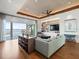 Bright living room with custom shelving and view of water at 6627 Bayou Grande Ne Blvd, St Petersburg, FL 33702