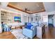 Bright living room features custom built-ins, modern decor and a waterfront view at 6627 Bayou Grande Ne Blvd, St Petersburg, FL 33702
