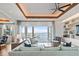 Bright living room with a large sectional sofa and water views at 6627 Bayou Grande Ne Blvd, St Petersburg, FL 33702