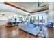 Open-concept living room and kitchen with waterfront views and lots of natural light at 6627 Bayou Grande Ne Blvd, St Petersburg, FL 33702
