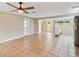 Open concept dining area with tile floors and a view into the kitchen at 2305 N Tampania Ave, Tampa, FL 33607