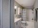 Full bathroom featuring a shower over tub and a vanity at 103 Cypress Pond Rd # 103, Palm Harbor, FL 34683