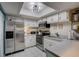 Well-lit kitchen with stainless steel appliances and ample cabinet space at 103 Cypress Pond Rd # 103, Palm Harbor, FL 34683